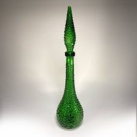 Full view of green hobnail genie bottle with stopper