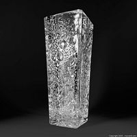 Front view of rectangular crystal vase showing water droplet texture