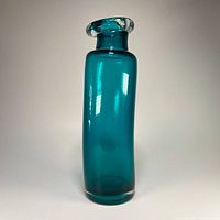 Full frontal view of teal Rosenthal Drunken Bottle vase