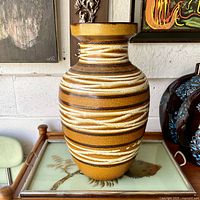 Front view of large Scheurich floor vase on tray table