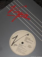 Label side of OMD “We Love You” showing Virgin logo and sleeve design