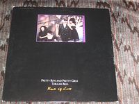 Front cover showing band photo and title