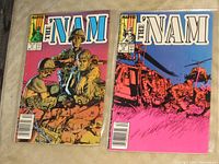 Front covers of Issues 11 and 13 showing artwork and issue numbers