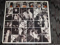 Front sleeve showing title and collage artwork