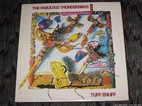 Front cover of The Fabulous Thunderbirds 'Tuff Enuff' LP