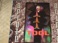 Front of Tool "Opiate" EP sleeve highlighting artwork and title