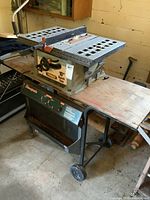 full view of table saw mounted on rolling stand