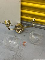 Front view of vanity light body with two clear glass shades removed