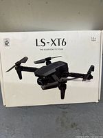 Front of retail box showing model LS-XT6