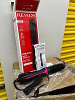 Full lot view showing brush, manual, box