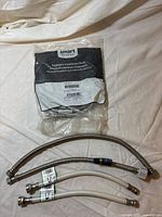 Front view showing sealed Smart Choice hose and four loose hoses