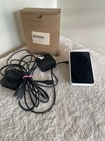 Terminal, power adapter, paper roll box