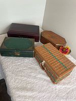 Group shot of four jewelry boxes on table