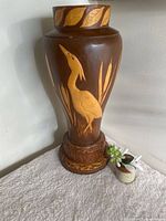 Full view of carved wood umbrella stand
