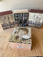 All four boxed VHS sets displayed together