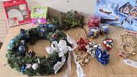 Overall lot showing wreath, ornaments, bows, craft items