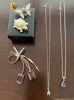 All six jewellery pieces displayed together