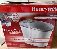 Retail box showing Honeywell Easy to Care Top Fill Warm Mist Humidifier details