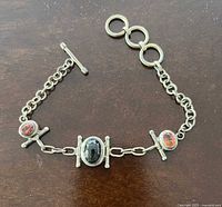 Full view of the sterling silver bracelet on flat surface