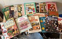 All seventeen craft books spread on table