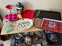Group shot showing all kitchenware and bakeware on table