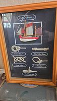 Framed knot board with ship and rope knots