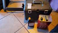 Ryobi chainsaw case with bar scabbard, fuel can, oil bottle
