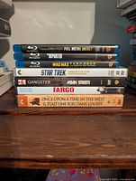 Stacked view of all seven disc cases