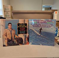 Front covers of Mario Lanza and The Waikikis records
