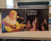 Neil Young and Rolling Stones LP covers side by side