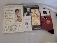 Lot overview showing both books and the socks