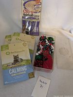 Overall lot with treat packs and toy container