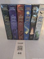 Front view of sealed boxed set showing six book spines