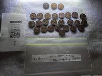 All pennies laid out with label indicating date range