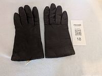 Front view of both gloves laid flat