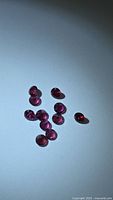 All ten garnets grouped on neutral background