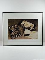 Front view of framed photograph under glass