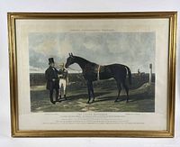 Full view of framed engraving showing image, titles, and gilt frame