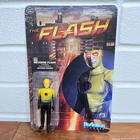 Front of sealed Reverse Flash ReAction figure packaging