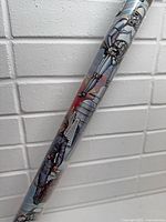 Close-up of characters and graphics on the wrapping paper roll