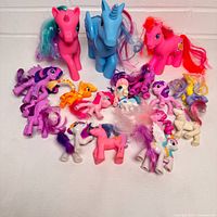 Full group shot of My Little Pony figures showing quantity and size variation