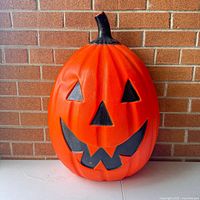 Front view of jack-o-lantern blow mold showing facial features