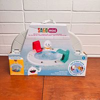 Front of sealed retail box showing Sago Mini Yeti's Pool Party bath toy set
