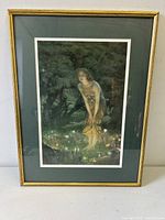 Frontal view of framed print showing artwork, frame, and mat