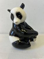 Front view of Lomonosov porcelain panda figurine