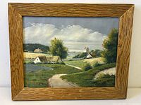 Front view of framed oil painting