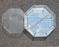 Cabinet and detached glass door displayed flat showing octagonal shape and materials