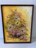 Front view of framed impasto floral painting
