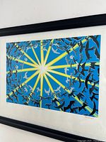 Framed screen print close view showing artwork, signature and numbering