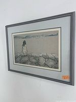 Angled view of full framed lithograph on wall